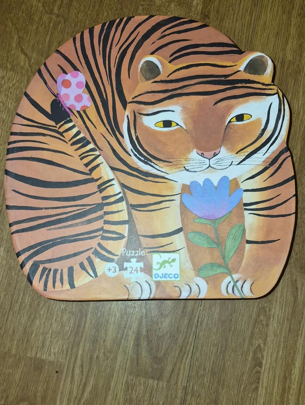 Tiger Shaped Puzzle with Flower Illustration